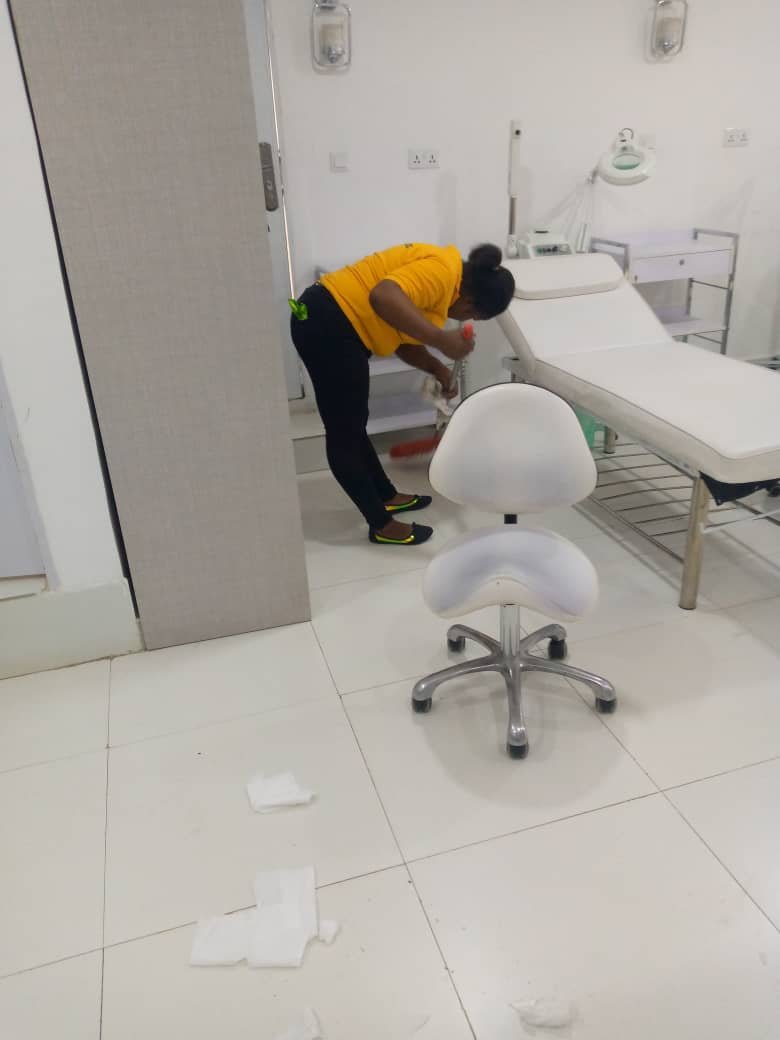 Dust and Wipes staff cleaning a specialist medical room in Abuja